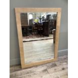 A rectangular pine effect wall mirror , 112cm x 80cm