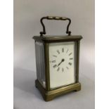 Brass carriage clock with French movement and Roman numeral dial, 14.5cm high