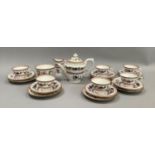 An early 20th century Royal Worcester tea service comprising six cups, six saucers, five side