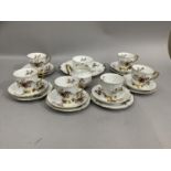 A Windsor china fruit decorated tea service for six settings