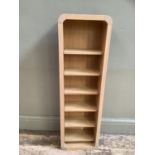 A modern storage shelving unit comprising six shelves, 100cm high, 30cm wide