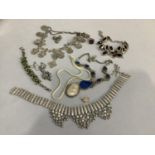 A collection of silver and white metal jewellery variously set with garnet, pendant, sodalite,