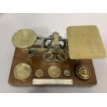 A Victorian set of mahogany and brass postal scales by Samuel Morden and Co with weights and ivory