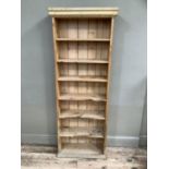 A set of pine shelves, 67cm wide x 174cm high x 26cm deep