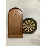 A bagatelle board and a dart board