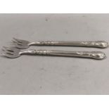 A pair of pickle forks by Christofle