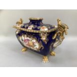 A 19th century Coalport ink stand, oblong, encrusted with flowers, enriched in gilt, 23cm by 17cm (