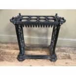 A Victorian cast iron umbrella or stick stand, drip tray missing, 60cm wide, 58cm high