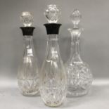 A pair of silver collared cut glass decanters, Birmingham 1996 33.5cm high, together with a