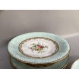 English china part dessert service painted in polychrome enamels with sprays of summer flowers