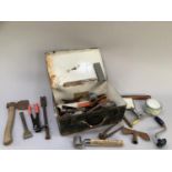 Vintage toolbox containing tools, sharpening stone, furniture wax etc