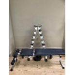 Kettler weight bench together with dumbell rack of graduated weights ranging from 5kg to 14kg