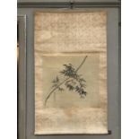 An early 20th Chinese scroll painted with song birds among bamboo fronds in watercolour on silk