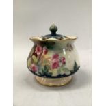 A Royal Worcester pot pourri vase painted with sprays of roses above a cut moulded border, wavy rim,