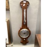 A Victorian figured walnut barometer thermometer
