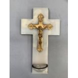 A marble and gilt metal crucifix, brass back plate with hanging ring and applied with a small