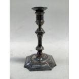 A Victorian silver baluster stem taperstick, Sheffield 1898, 11.5cm together with a George IV