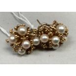 A pair of cultured pearl cluster earrings in 9ct gold, c.1961, each set with approximate 5mm
