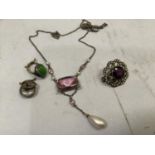 An early 20th necklace in silver, collet set with pink faceted paste and a pendant simulated pearl