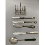 A Geo V silver five bar toast rack, Chester 1914, together with four Victorian and later silver