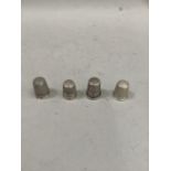 Four early 20th century silver thimbles, total approximate weight 15gm
