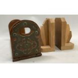 A pair of Deco style oak bookends together with a Victorian walnut and brass folding book stand