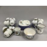 A Shelley tea service of Idalium pattern comprising twelve cups, twelve saucers, twelve side plates,
