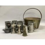 Five planished pewter tankards together with two further tankards, small beaker with moulded knop,