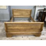 A Barker and Stonehouse beech King size sleigh bed with head stead, slats and side supports, 160cm
