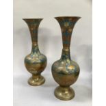 A pair of slender necked flare rimmed brass and enamelled vases, the neck and shoulders on turquoise