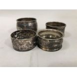 Four 19th century and early 20th century silver napkin rings, total approximate weight 2oz