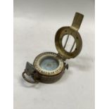 A WWI era brass cased compass stamped G E C No.B138176