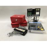 Two cash safes with keys, nine piece combination spanner set, HP Financial calculator, Panasonic