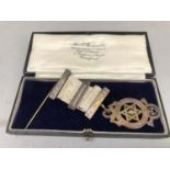 A Masonic Benevolentia jewel in silver on ribbon with bars and pin in original box, hallmarked