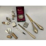 A pair of silver gilt glove stretchers, silver gilt file, silver napkin ring, match box cover,