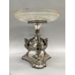 A Victorian silver plated and glass centre piece having a shallow glass dish etched with borders