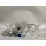 Quantity of glassware to include lustre vase and jug, four cut glass flower vases with flared