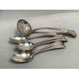 A Victorian king pattern Scottish silver sifting spoon by Marshall and Sons, Edinburgh 1849 and five