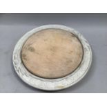 A Victorian white stoneware bread board stand circular, moulded with a rope twist border, the