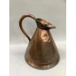 An early 20th century copper four gallon measure, 49cm high
