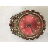 An early 20th century eight day trace clock by Schild & Co in a gilt metal case set to the bezel