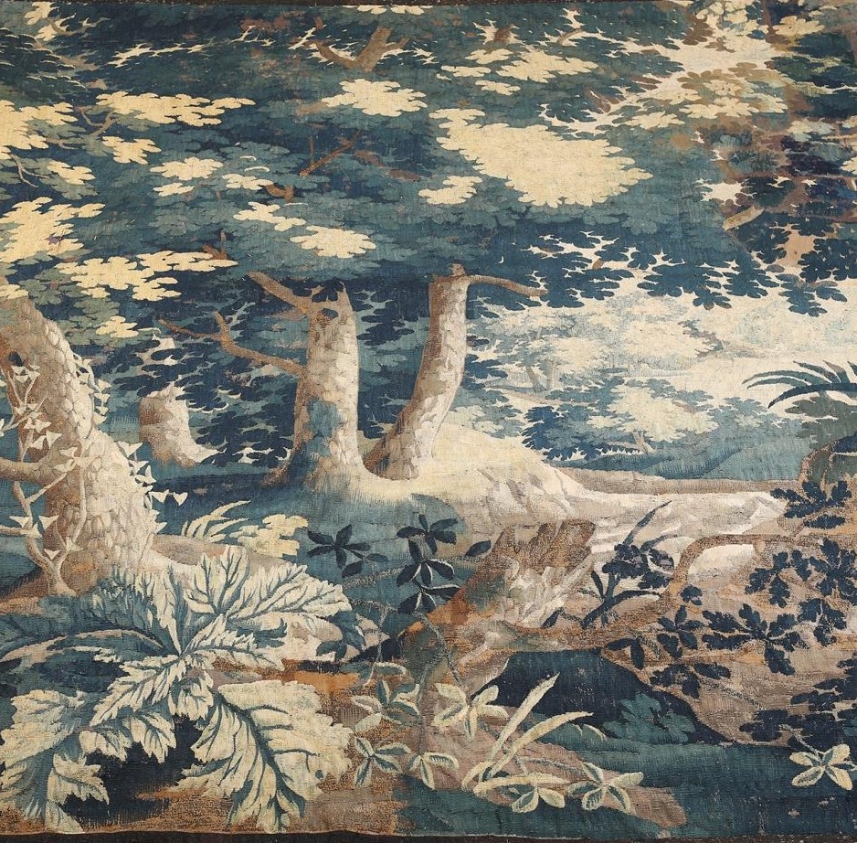 A LATE 17TH CENTURY OR EARLY 18TH CENTURY VERDURE TAPESTRY HANGING, French or Flemish, in a