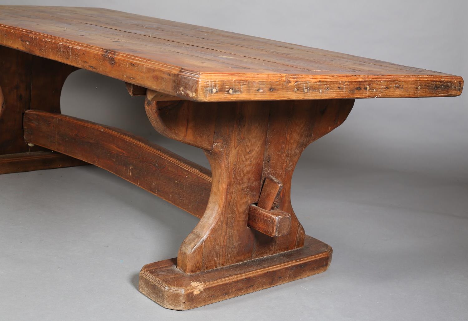 AN EARLY 20TH CENTURY FRENCH PINE REFECTORY DINING TABLE, the planked top with cleat ends, on - Image 2 of 6