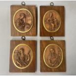A SET OF FOUR EARLY 17TH CENTURY FLEMISH DEVOTIONAL BOXWOOD MEDALLIONS, oval, finely carved in
