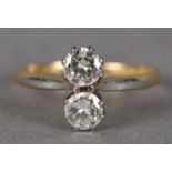 A TWO STONE DIAMOND RING c.1950 in 18ct yellow and white gold, the brilliant cut stones claw set,