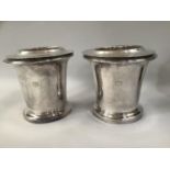 A PAIR OF LATE 19TH CENTURY SILVER PLATED WINE COOLERS, the tapered cylindrical form engraved with