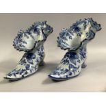 A PAIR OF LATE 19TH CENTURY FRENCH MOSANIC FAIENCE ORNAMENTAL SHOES in blue and white, hand-