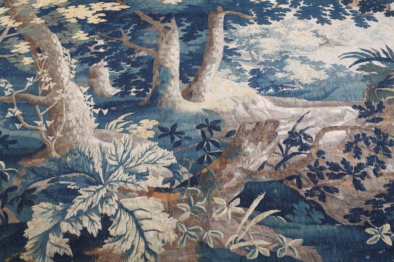 A LATE 17TH CENTURY OR EARLY 18TH CENTURY VERDURE TAPESTRY HANGING, French or Flemish, in a - Image 3 of 7