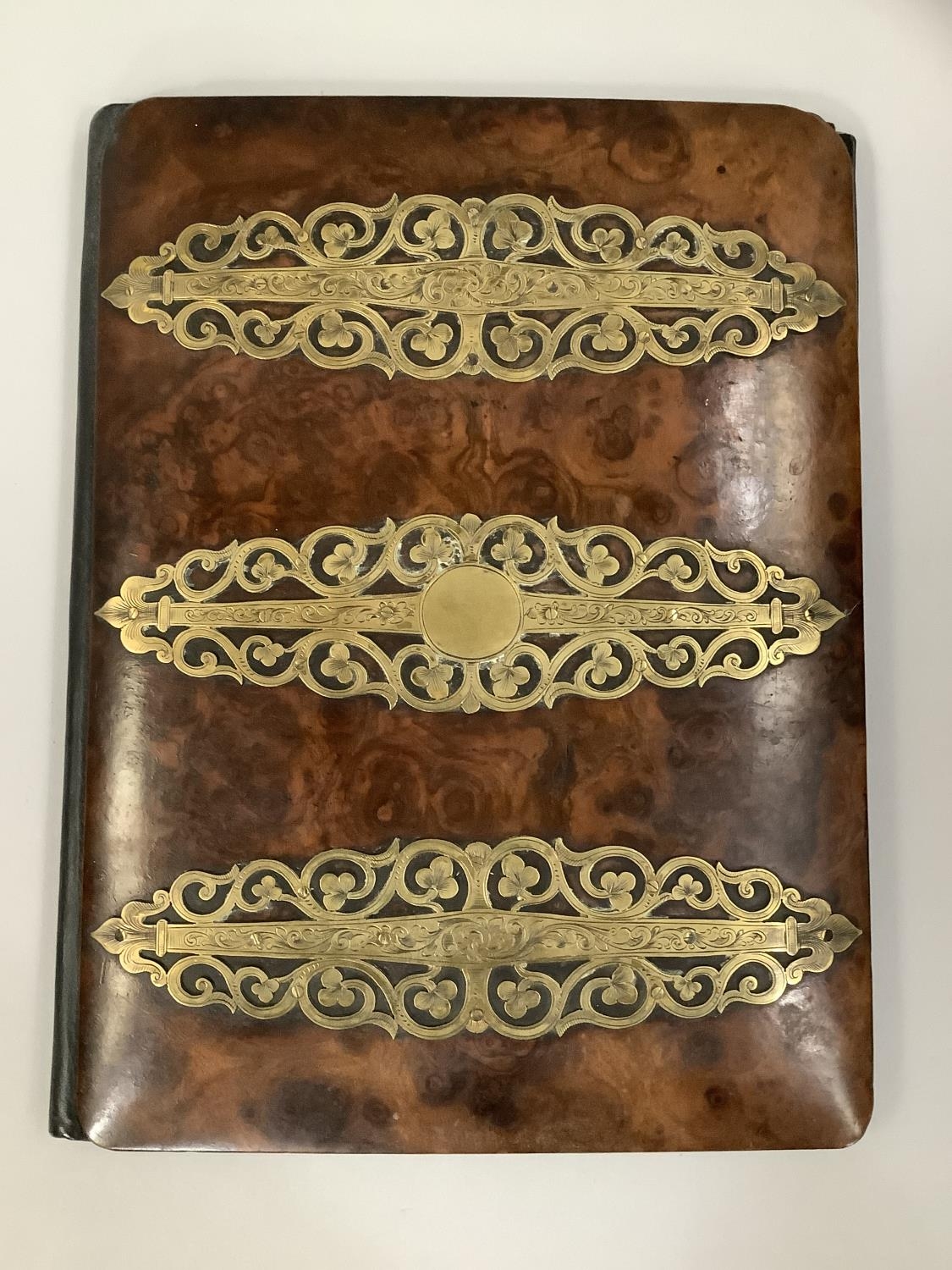 A VICTORIAN BURR WALNUT AND CUT BRASS STRAPWORK BLOTTER, lined in leather, 28cm x 21.5cm - Image 2 of 4