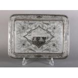 A COLONIAL STYLE TRAY, of rectangular outline with rounded corners, foliate pierced edge and